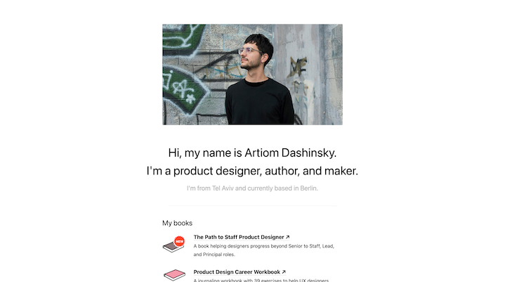 Screenshot of Artiom Dashinsky’s personal website featuring a hero image, introductory bio, and links to published books