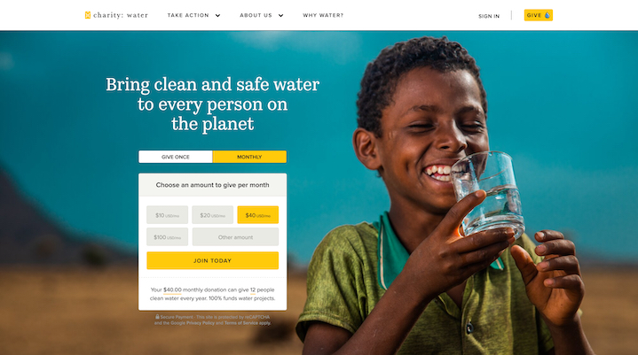Screenshot of charity: water homepage showing a smiling child drinking clean water with donation options to support safe water projects